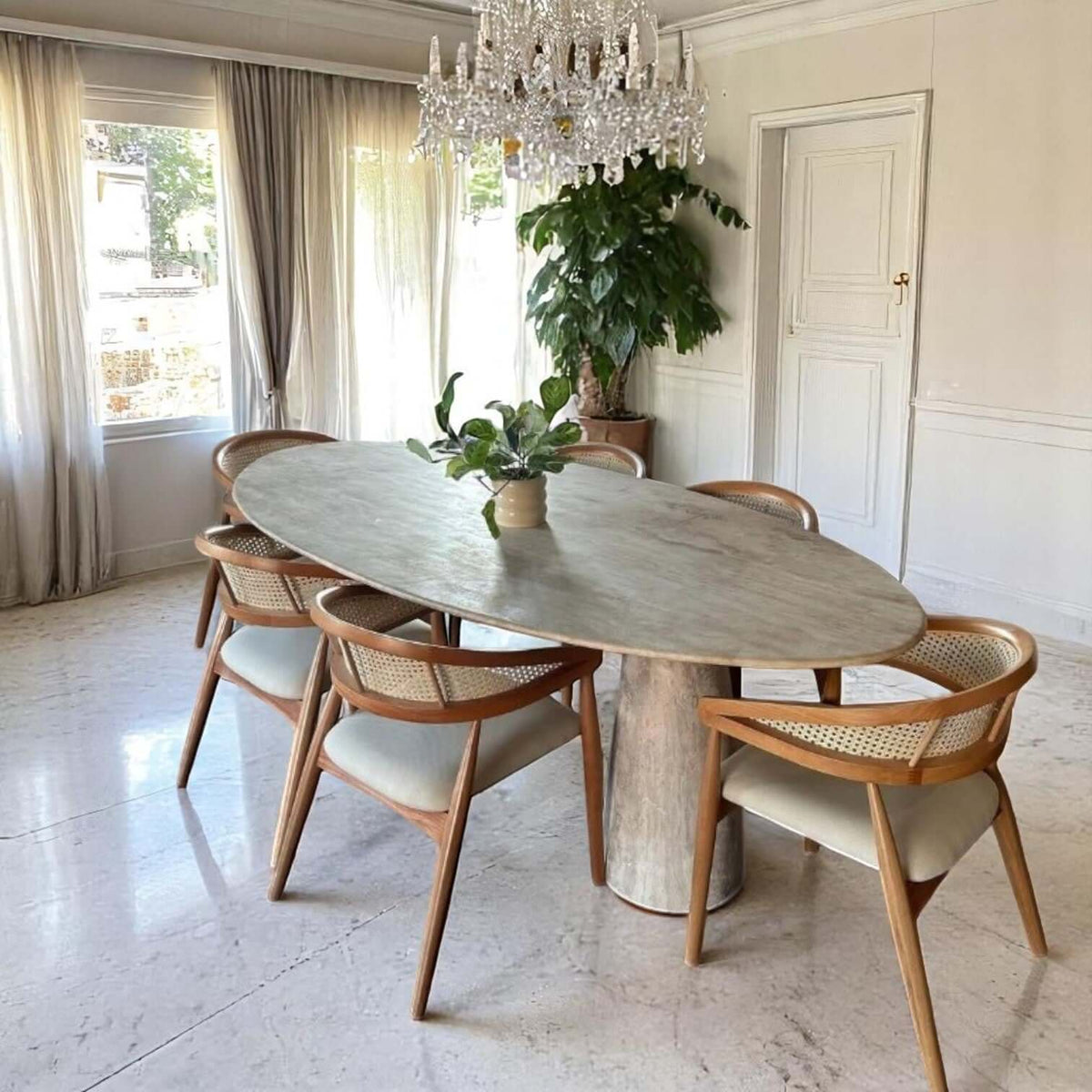 Stylish & Natural: Add Elegance to Your Table with Oval Travertine Dining Table